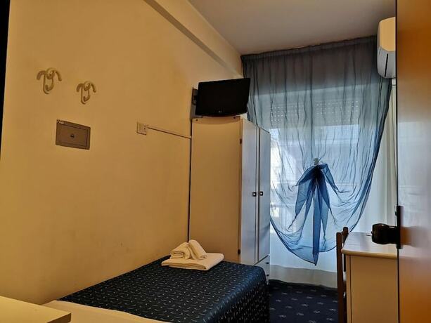 Imagen de la habitación del Hotel La Cappuccina. Foto 18