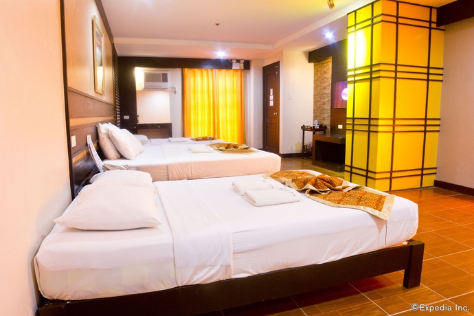 Imagen de la habitación del Hotel La Carmela De Boracay Resort. Foto 8