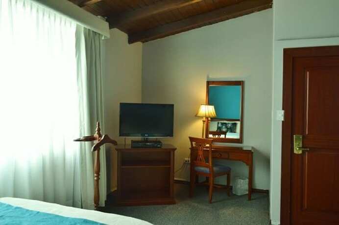 Imagen de la habitación del Hotel La Carolina Inn. Foto 17