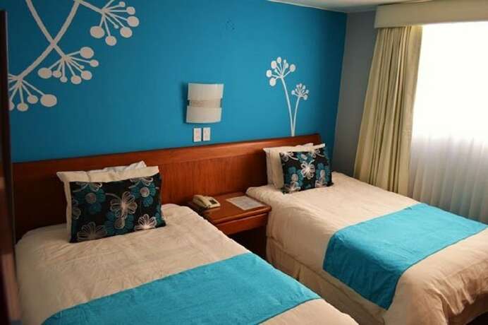 Imagen de la habitación del Hotel La Carolina Inn. Foto 19