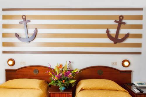 Imagen de la habitación del Hotel La Carruba. Foto 16