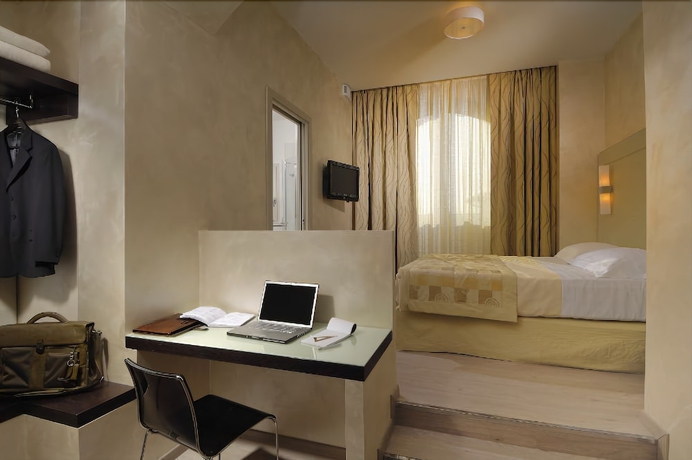 Imagen de la habitación del Hotel La Cartiera. Foto 7