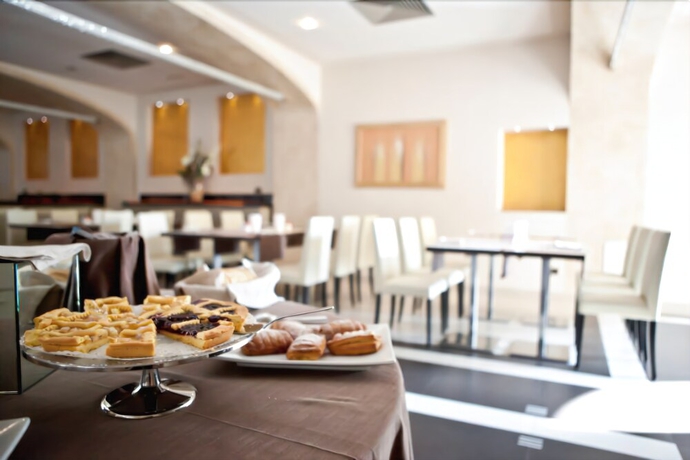 Imagen del bar/restaurante del Hotel La Cartiera. Foto 5