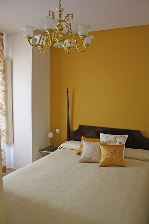 Imagen de la habitación del Hotel La Casa Azul Bandb Apartments. Foto 6