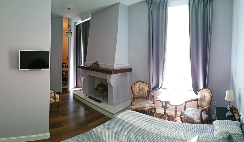 Imagen de la habitación del Hotel La Casa Azul Bandb Apartments. Foto 9