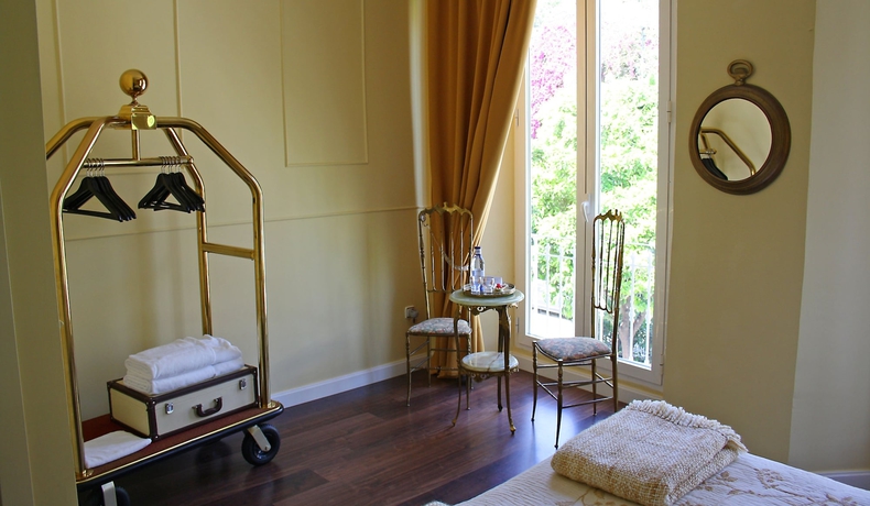 Imagen de la habitación del Hotel La Casa Azul Bandb Apartments. Foto 10