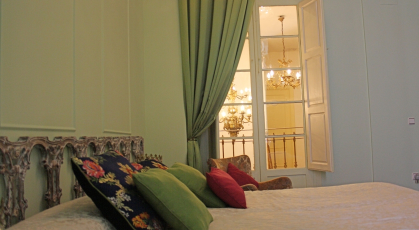 Imagen de la habitación del Hotel La Casa Azul Bandb Apartments. Foto 12