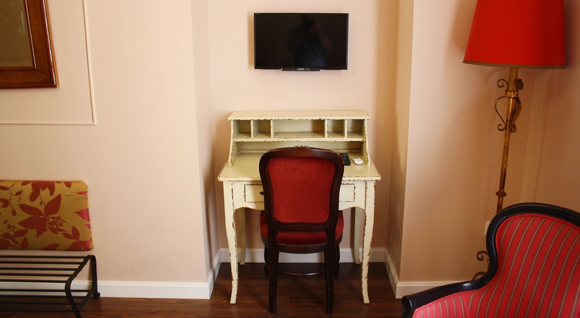 Imagen de la habitación del Hotel La Casa Azul Bandb Apartments. Foto 13