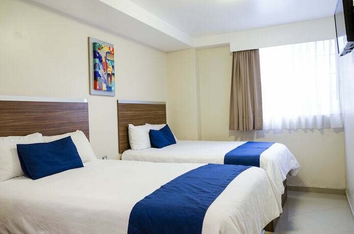 Imagen de la habitación del Hotel La Casa Azul. Foto 19