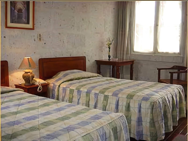 Imagen de la habitación del Hotel La Casa De Margott. Foto 5