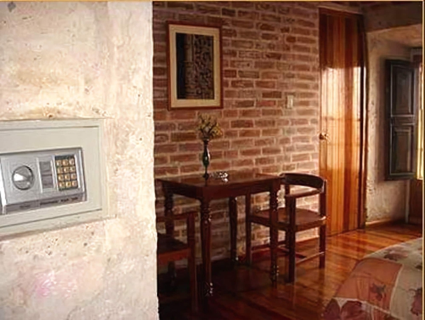 Imagen de la habitación del Hotel La Casa De Margott. Foto 8