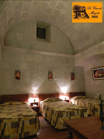 Imagen de la habitación del Hotel La Casa De Margott. Foto 11