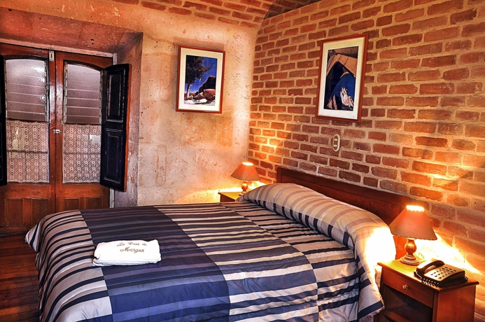 Imagen de la habitación del Hotel La Casa De Margott. Foto 12