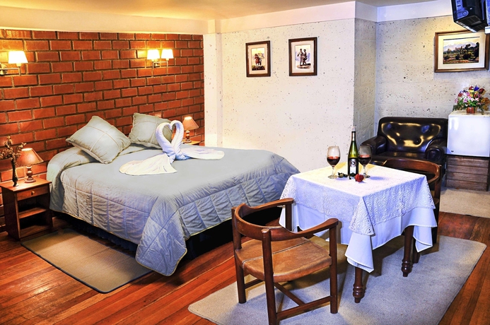 Imagen de la habitación del Hotel La Casa De Margott. Foto 13