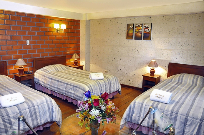 Imagen de la habitación del Hotel La Casa De Margott. Foto 14
