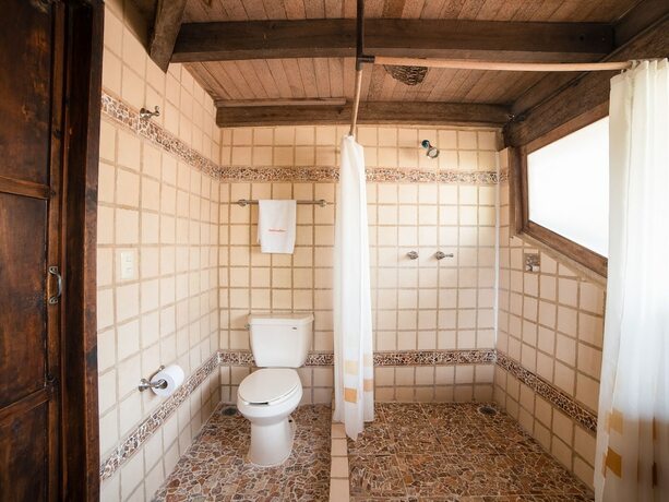 Imagen de la habitación del Hotel La Casa De Piedra By Rotamundos. Foto 13