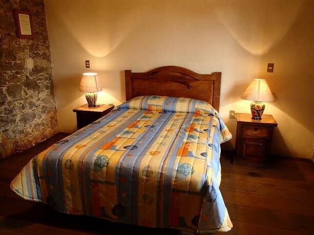 Imagen de la habitación del Hotel La Casa De Piedra By Rotamundos. Foto 14