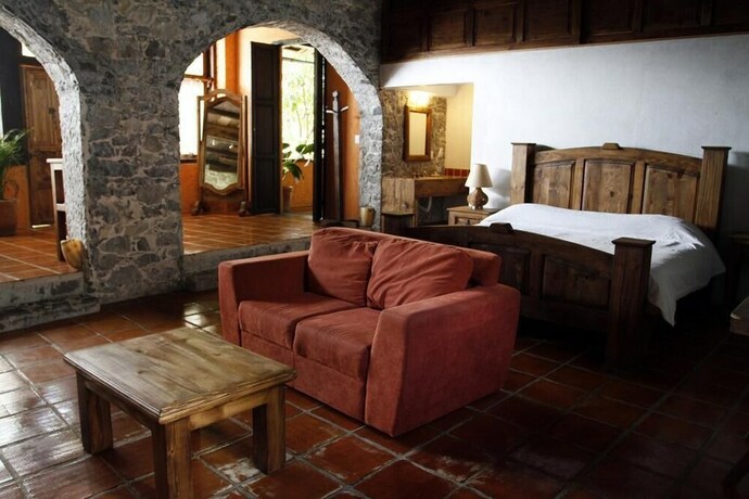 Imagen de la habitación del Hotel La Casa De Piedra By Rotamundos. Foto 16