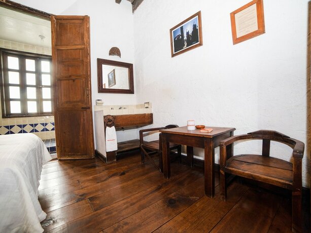 Imagen de la habitación del Hotel La Casa De Piedra By Rotamundos. Foto 26