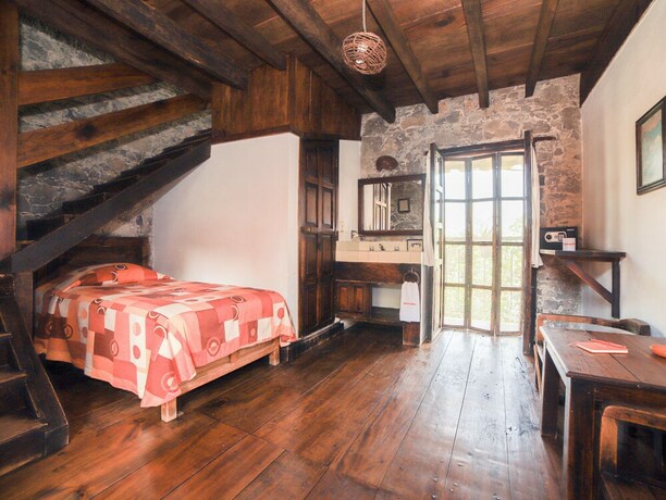 Imagen de la habitación del Hotel La Casa De Piedra By Rotamundos. Foto 33