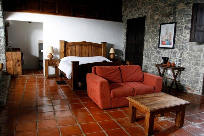 Imagen de la habitación del Hotel La Casa De Piedra By Rotamundos. Foto 34