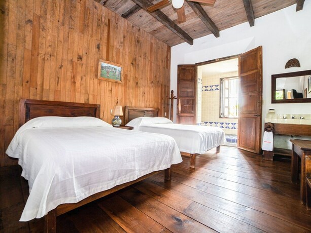 Imagen de la habitación del Hotel La Casa De Piedra By Rotamundos. Foto 36