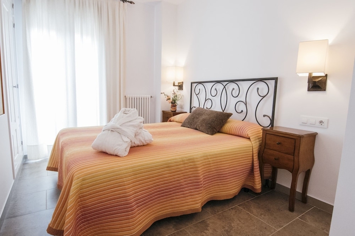 Imagen de la habitación del Hotel La Casa Dels Abeuradors. Foto 6