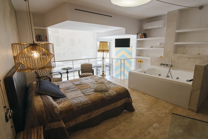 Imagen de la habitación del Hotel La Casa Dels Abeuradors. Foto 8