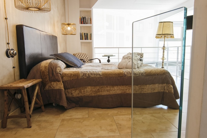 Imagen de la habitación del Hotel La Casa Dels Abeuradors. Foto 9