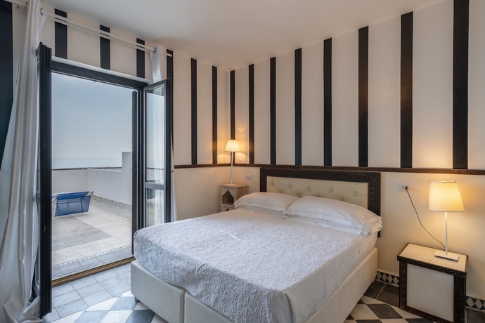 Imagen de la habitación del Hotel La Casa E Il Mare. Foto 13