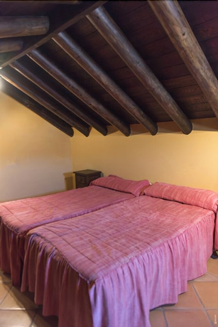 Imagen de la habitación del Hotel La Casa Grande De El Burgo. Foto 13