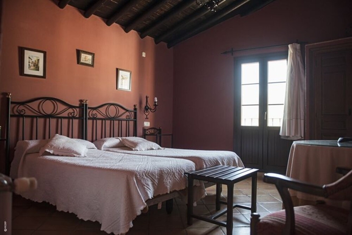 Imagen de la habitación del Hotel La Casa Grande De El Burgo. Foto 16