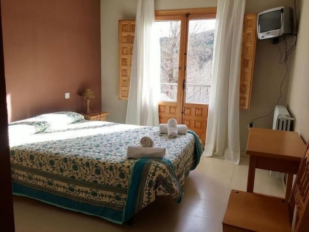 Imagen de la habitación del Hotel La Casa Grande Fuertescusa. Foto 13