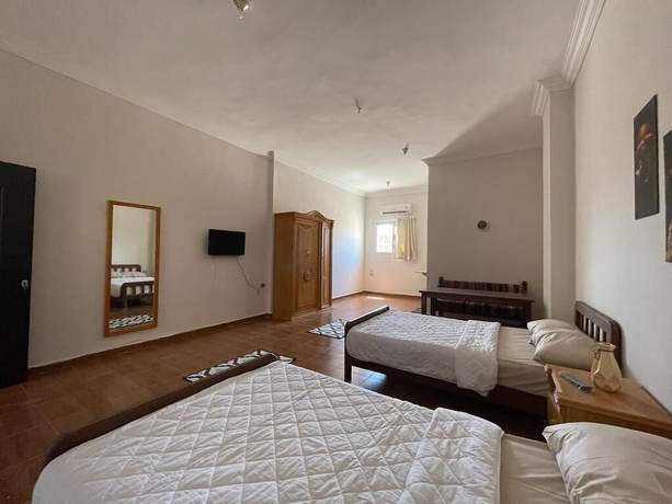Imagen de la habitación del Hotel La Casa Guest House. Foto 5