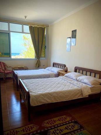 Imagen de la habitación del Hotel La Casa Guest House. Foto 6