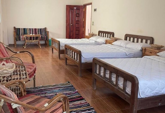 Imagen de la habitación del Hotel La Casa Guest House. Foto 10
