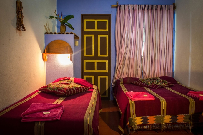 Imagen de la habitación del Hotel La Casa Rosa Sa. Foto 10