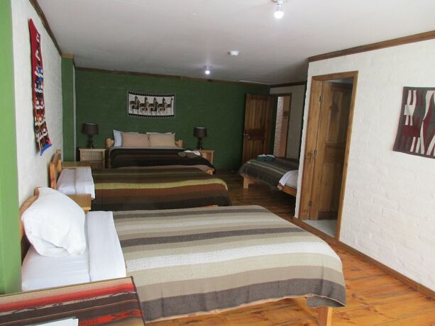 Imagen de la habitación del Hotel La Casa Verde, Ba&ntilde;os de Agua Santa. Foto 13