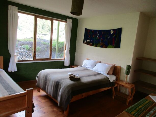 Imagen de la habitación del Hotel La Casa Verde, Ba&ntilde;os de Agua Santa. Foto 14