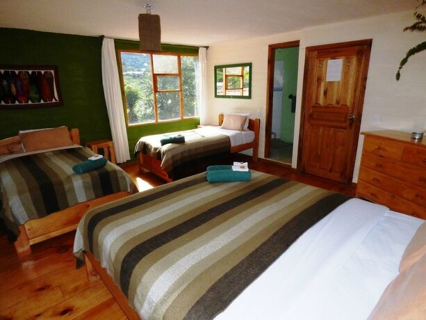 Imagen de la habitación del Hotel La Casa Verde, Ba&ntilde;os de Agua Santa. Foto 15