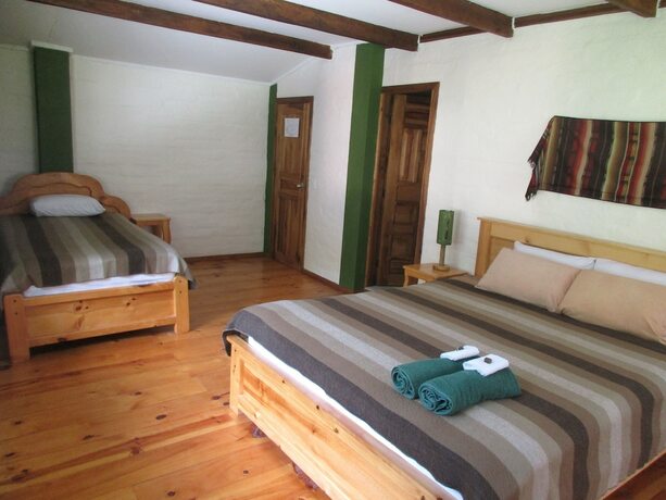 Imagen de la habitación del Hotel La Casa Verde, Ba&ntilde;os de Agua Santa. Foto 18