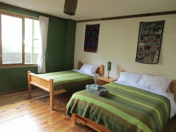 Imagen de la habitación del Hotel La Casa Verde, Ba&ntilde;os de Agua Santa. Foto 20