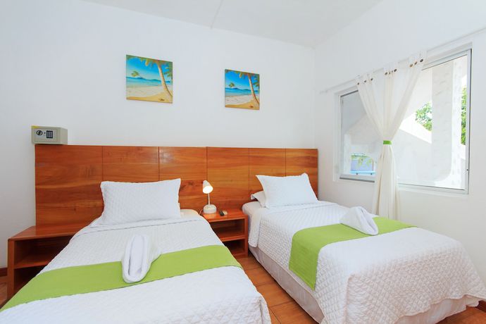 Imagen de la habitación del Hotel La Casa de Judy. Foto 12