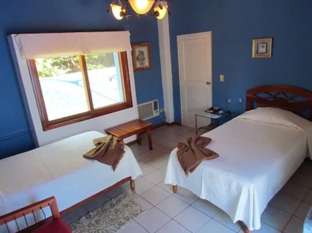 Imagen de la habitación del Hotel La Casa de Marita. Foto 13