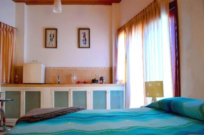 Imagen de la habitación del Hotel La Casa de Marita. Foto 17