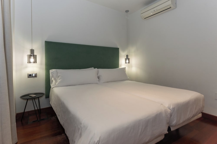 Imagen de la habitación del Hotel La Casa de la Alameda. Foto 9