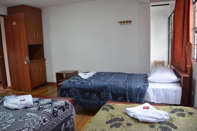 Imagen de la habitación del Hotel La Casa del Cafe. Foto 4