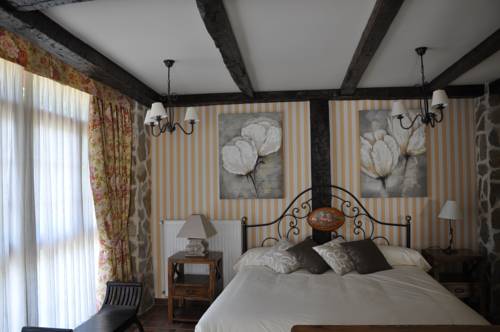 Imagen de la habitación del Hotel La Casa del Puente. Foto 4