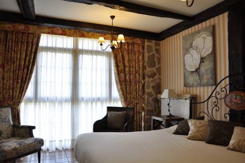 Imagen de la habitación del Hotel La Casa del Puente. Foto 6