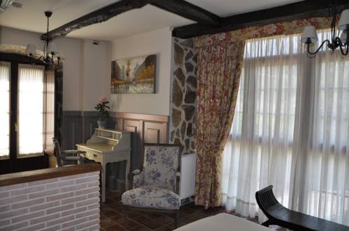 Imagen de la habitación del Hotel La Casa del Puente. Foto 7